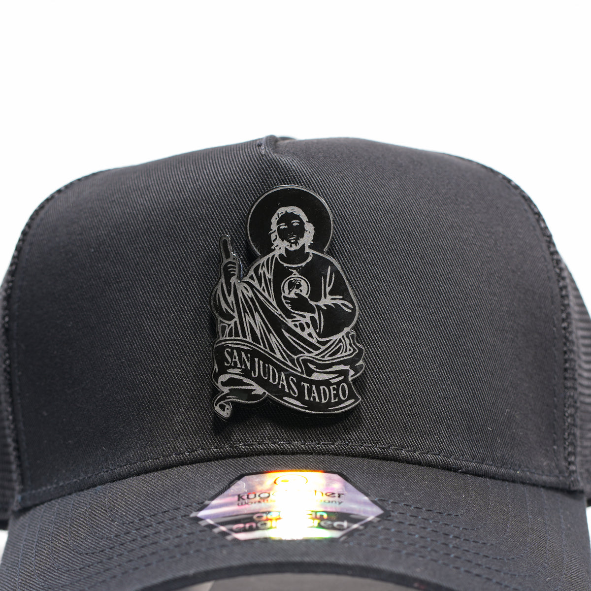 San Judas Tadeo y manos rezando placa en Trucker